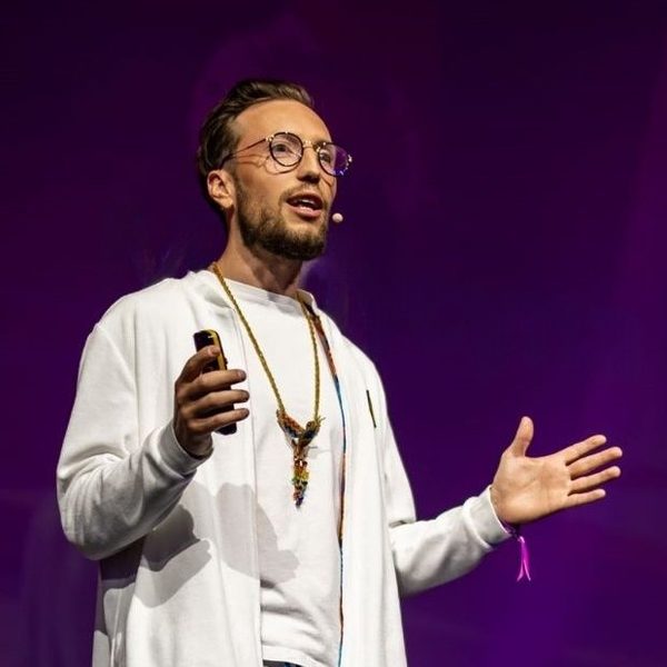 Paul Nazaruk speaking on stage